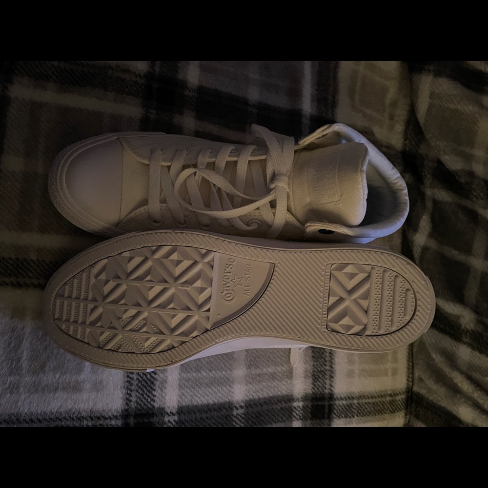 White mid-top converse